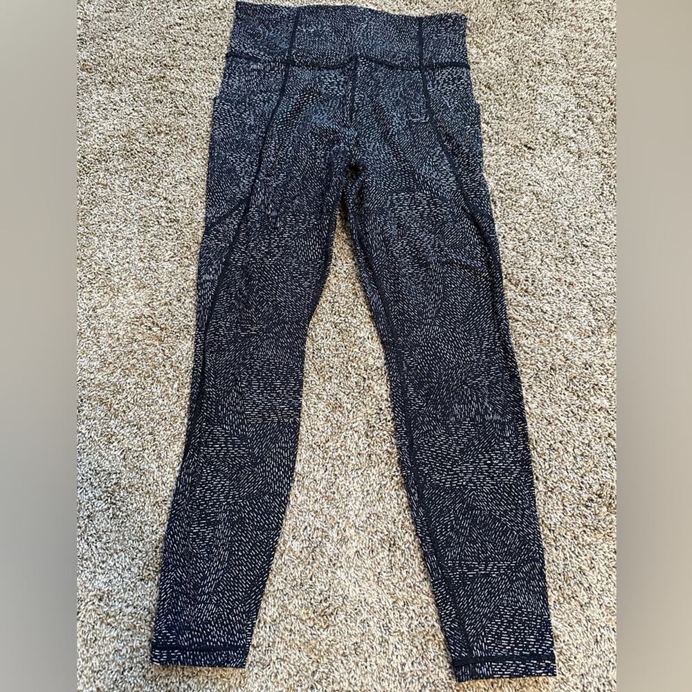 Athleta size medium, womenβs leggings, black and white